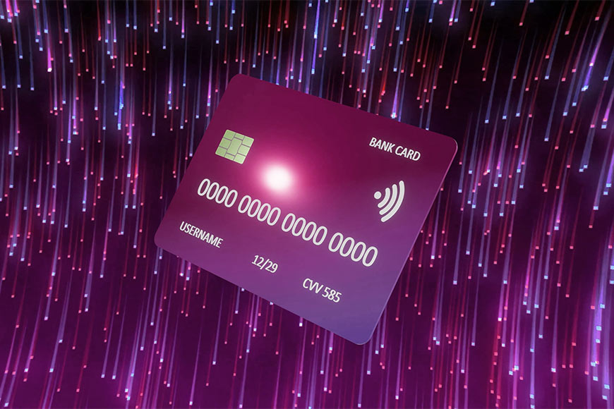 Illustration showing credit card on sparkly motion blur background in pinks and purples