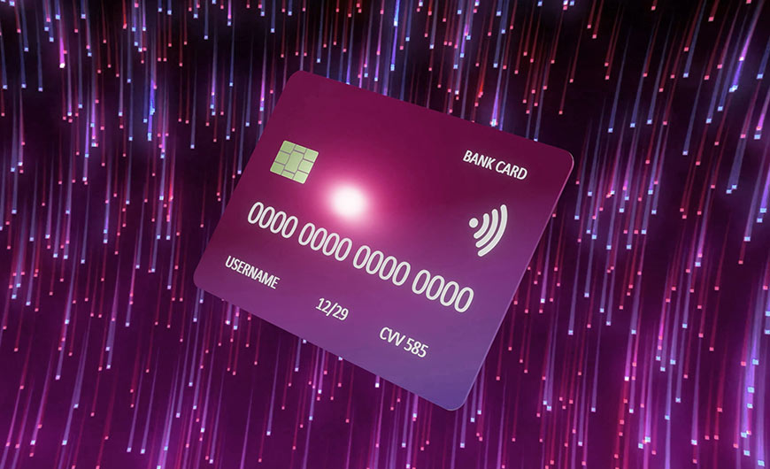 Illustration showing credit card on sparkly motion blur background in pinks and purples